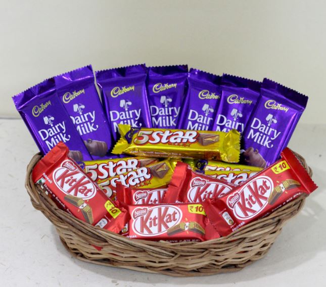 Designer Rakhi with Cadbury Celebrations Gift Pack of 5 Assorted Chocolates  and Roli Chawal Pack, Best Wishes Greeting Card - eCraftIndia Online